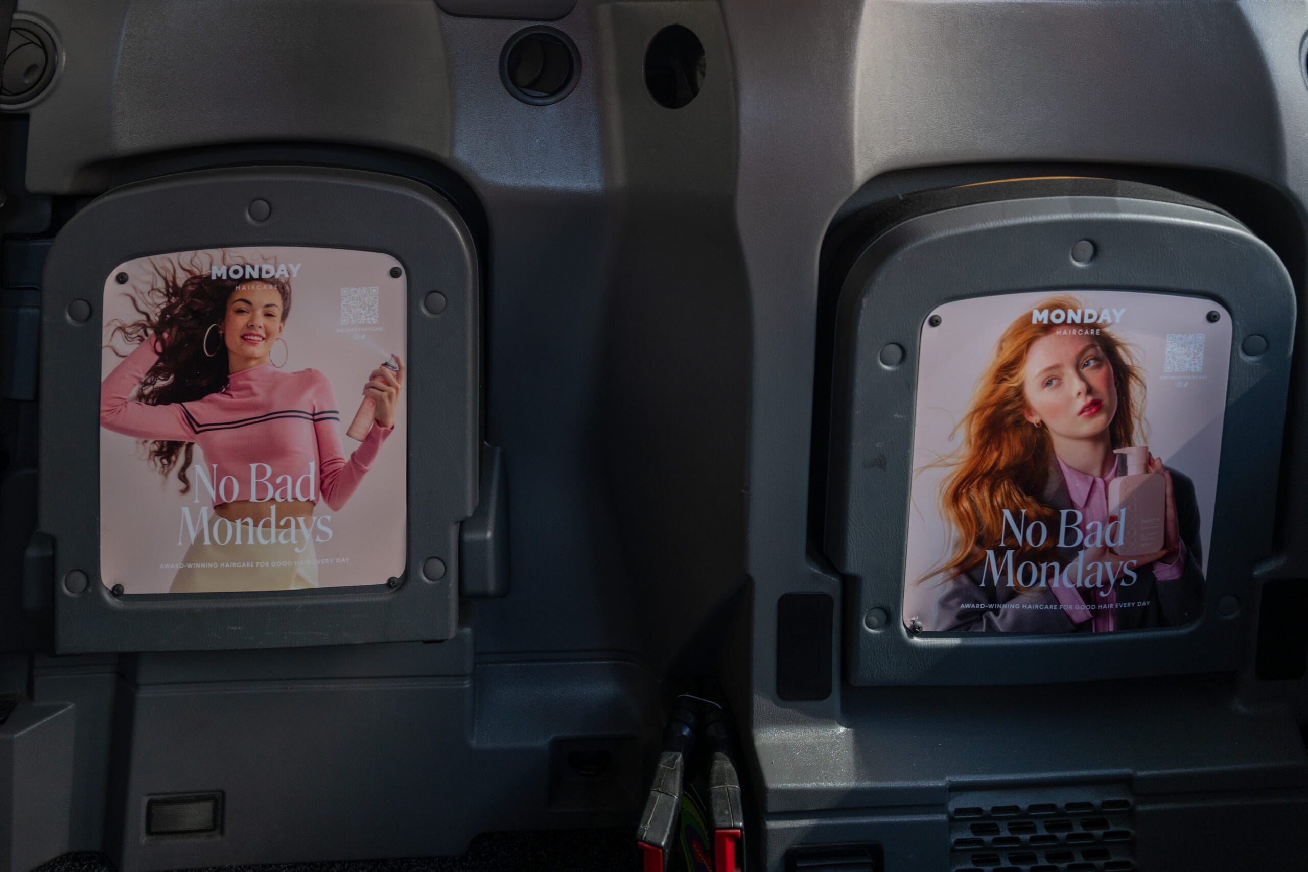 Example of tip-seat advertising inside taxis, in London.