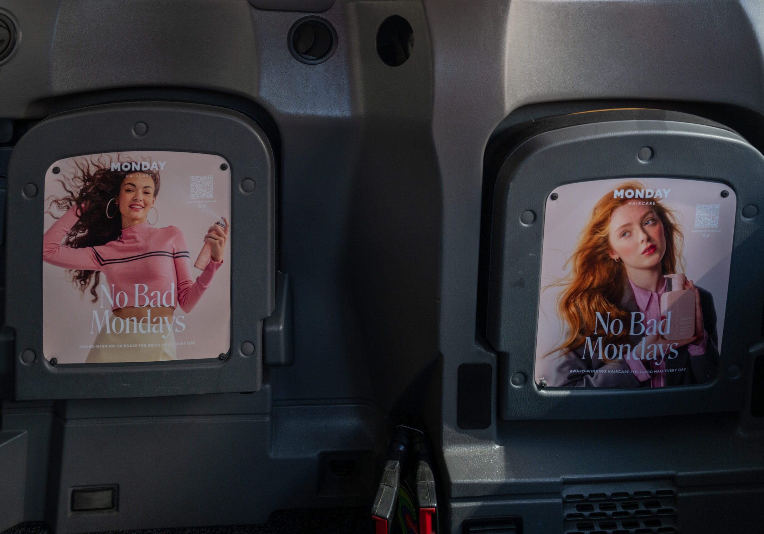 Example of tip-seat advertising inside taxis, in London.